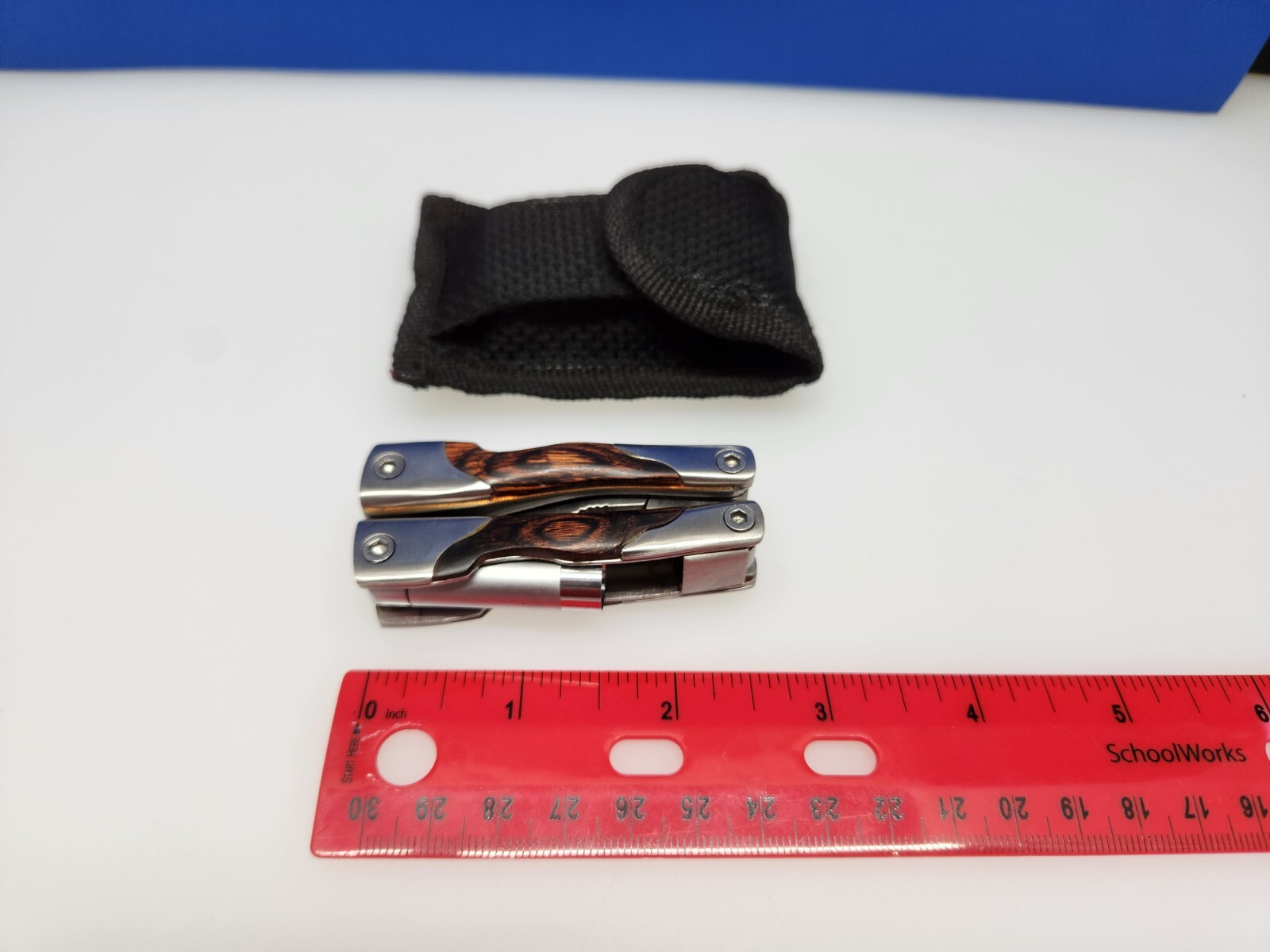 Multi Tool Pliers Saw Screwdriver More Black Nylon Sheath Woodgrain Smaller