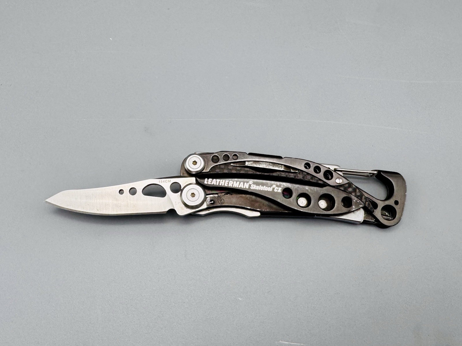 Leatherman Skeletool CX Carbon Fiber 154CM Multi-Tool w/ Box & Bit Used
