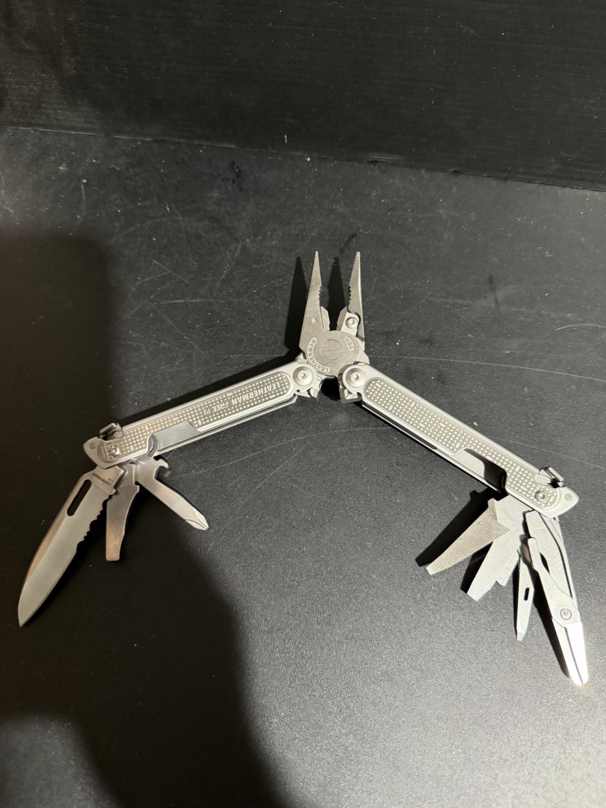 Discontinued New in box Leatherman FREE P2 Multitool 19 Stainless Steel One Hand