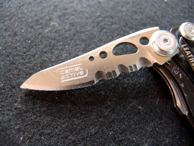 LEATHERMAN SKELETOOL CX–RETIRED–SERRATED–CARBON FIBER TRIM–MULTI TOOL