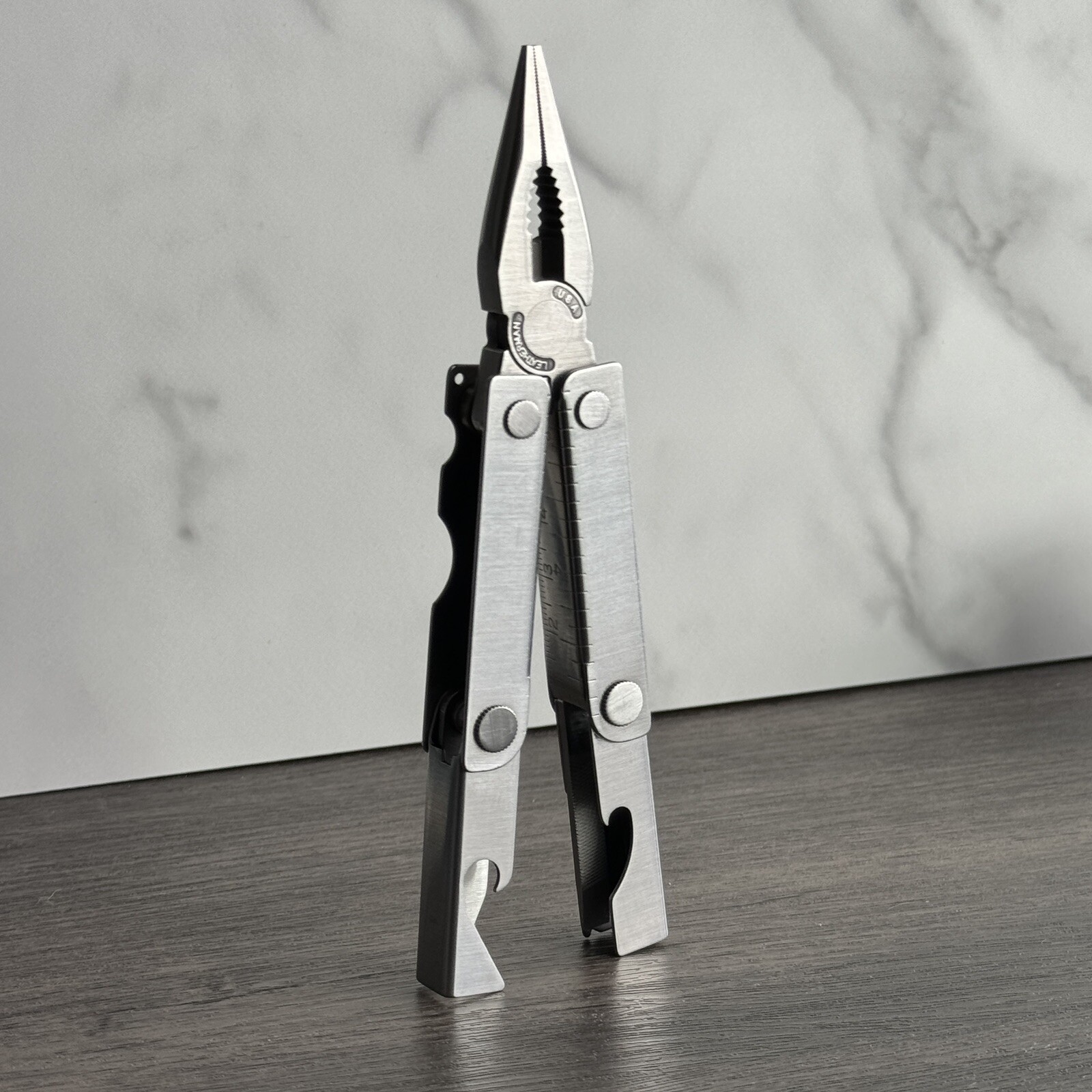 Leatherman MINI TOOL multitool. Variant w/US PAT 4744272 and a Blank side