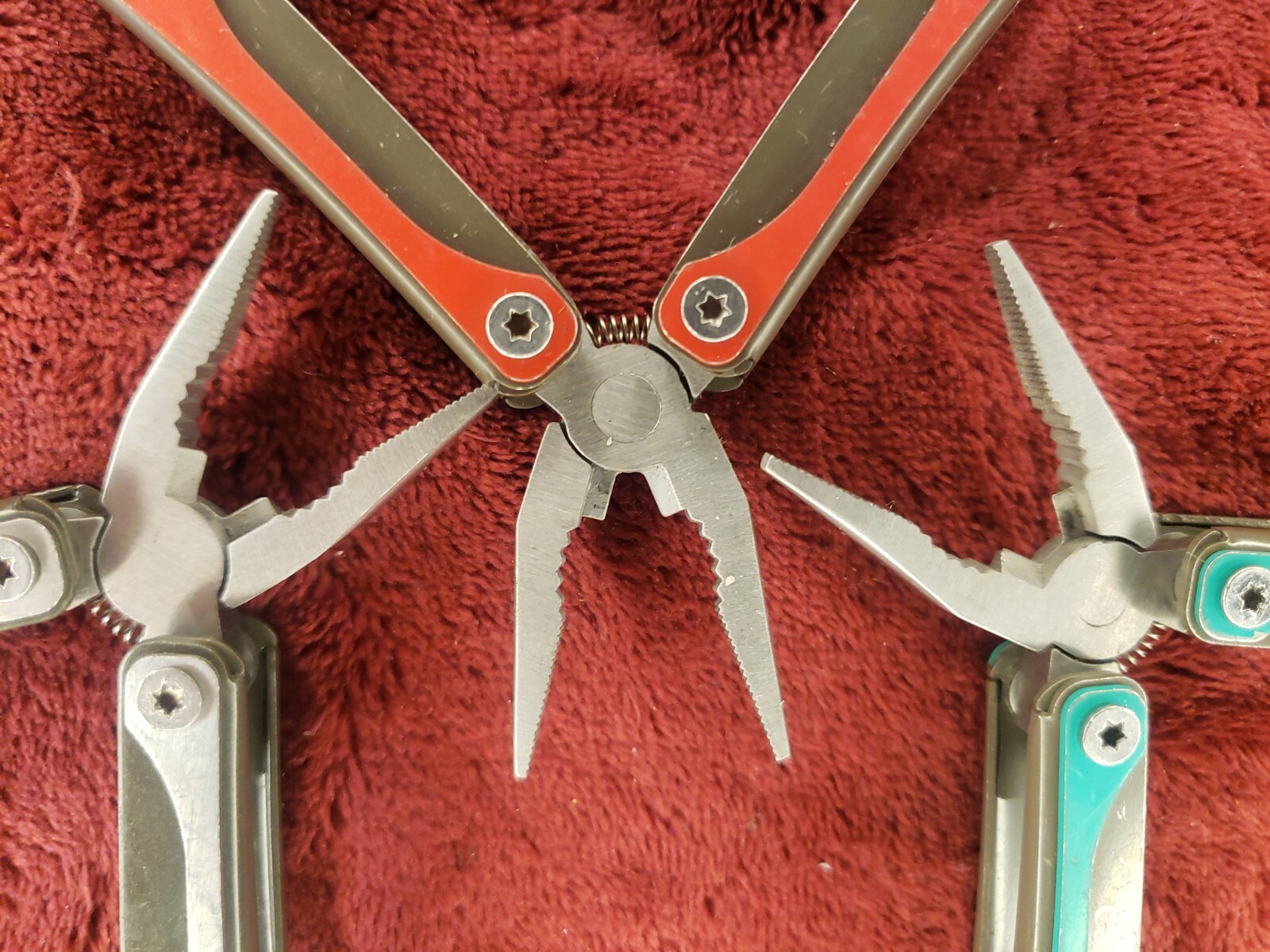 Lot of three Cabela’s Multi Tool Stainless Clear, Teal Green & Red