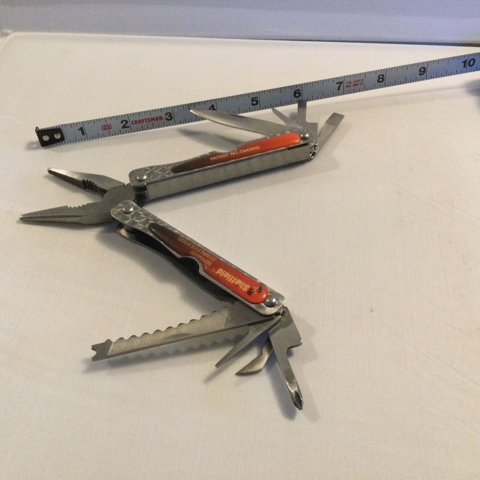 Sheffield #12000 Stainless Steel Multi Tool Pliers Knife Scaler With Belt Case