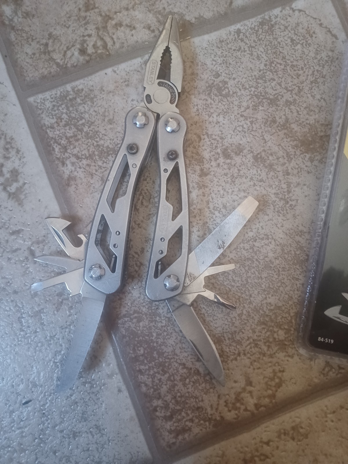 New and Used STANLEY -IN-1 STAINLESS STEEL MULTITOOL WITH BLACK POUCH (84-519)