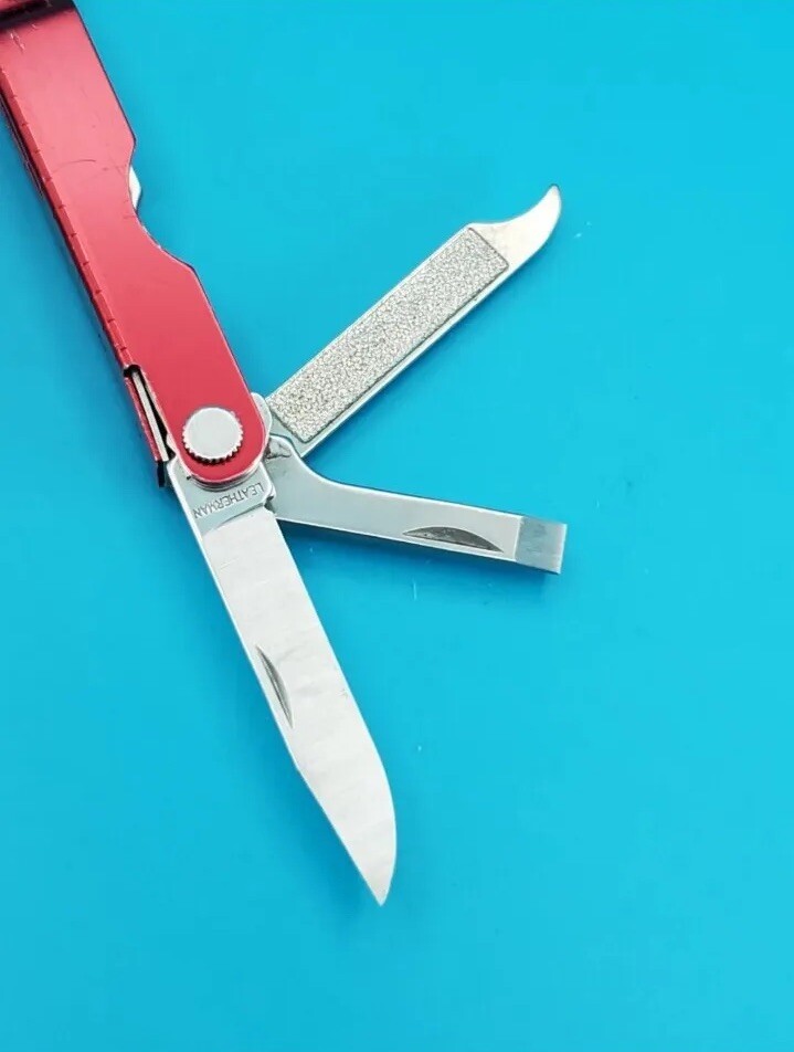 Leatherman Micra Multi-Tool, Knife, Scissors, Key Ring, Red Color in Good Condit