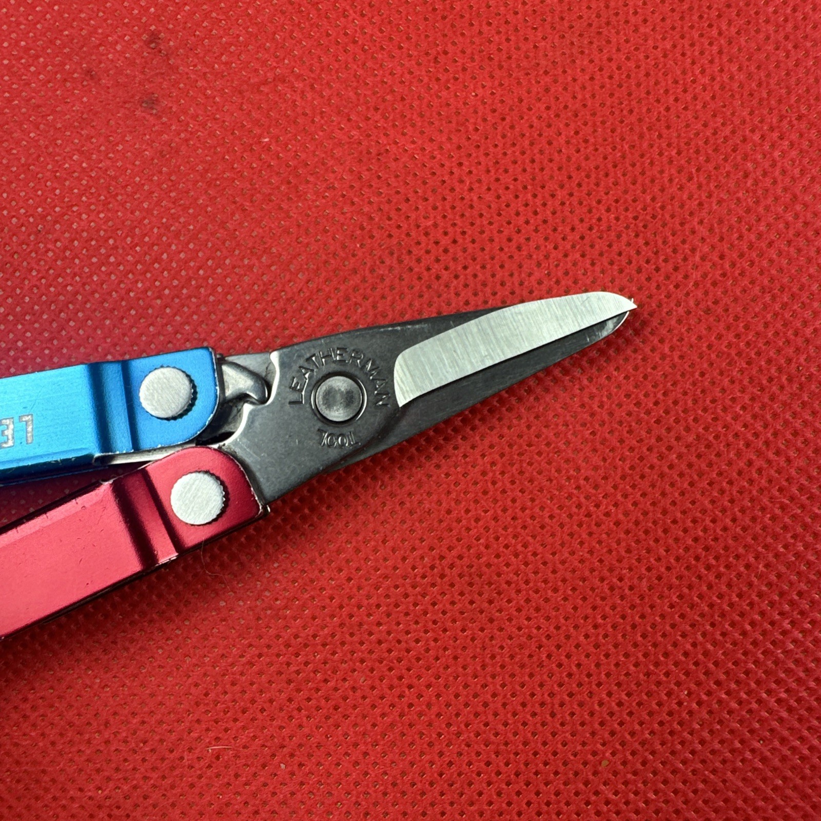 Red Blue Leatherman Micra Multi-Tool, scissor, knife, tweezer, screwdriver, EDC
