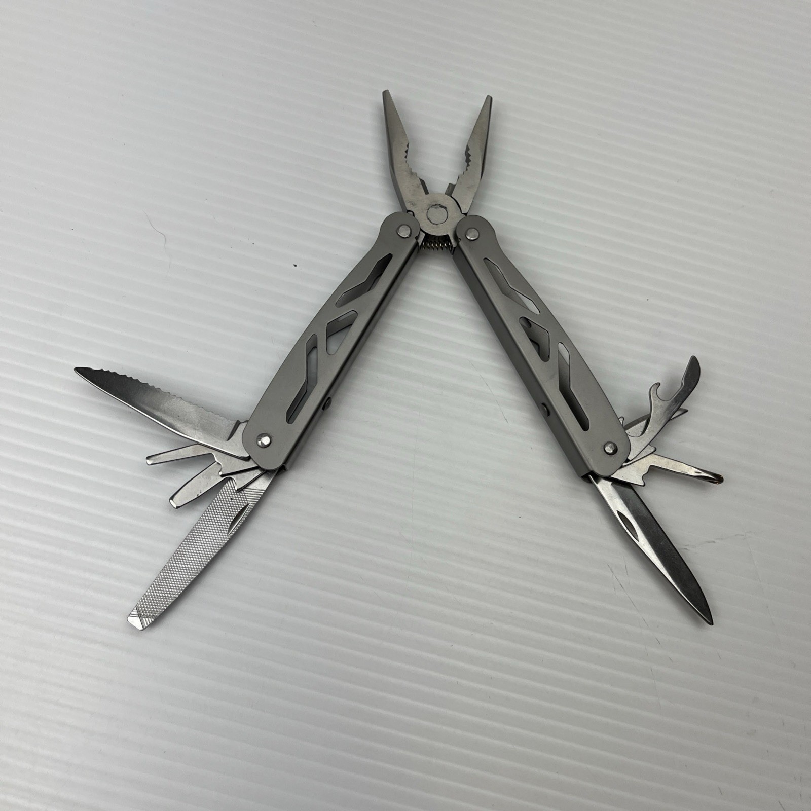 Multi Tool Pliers Knife File Saw Bottle Opener Survival Camping Gear