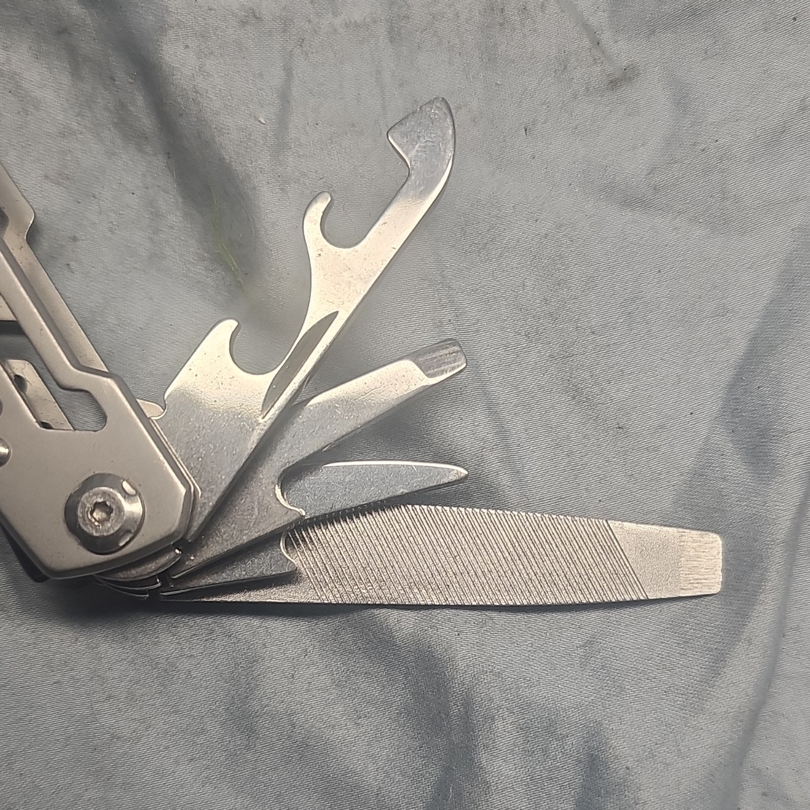 Silver Stainless Steel Multi-Tool with 7 Tools: Plier, Knife, File