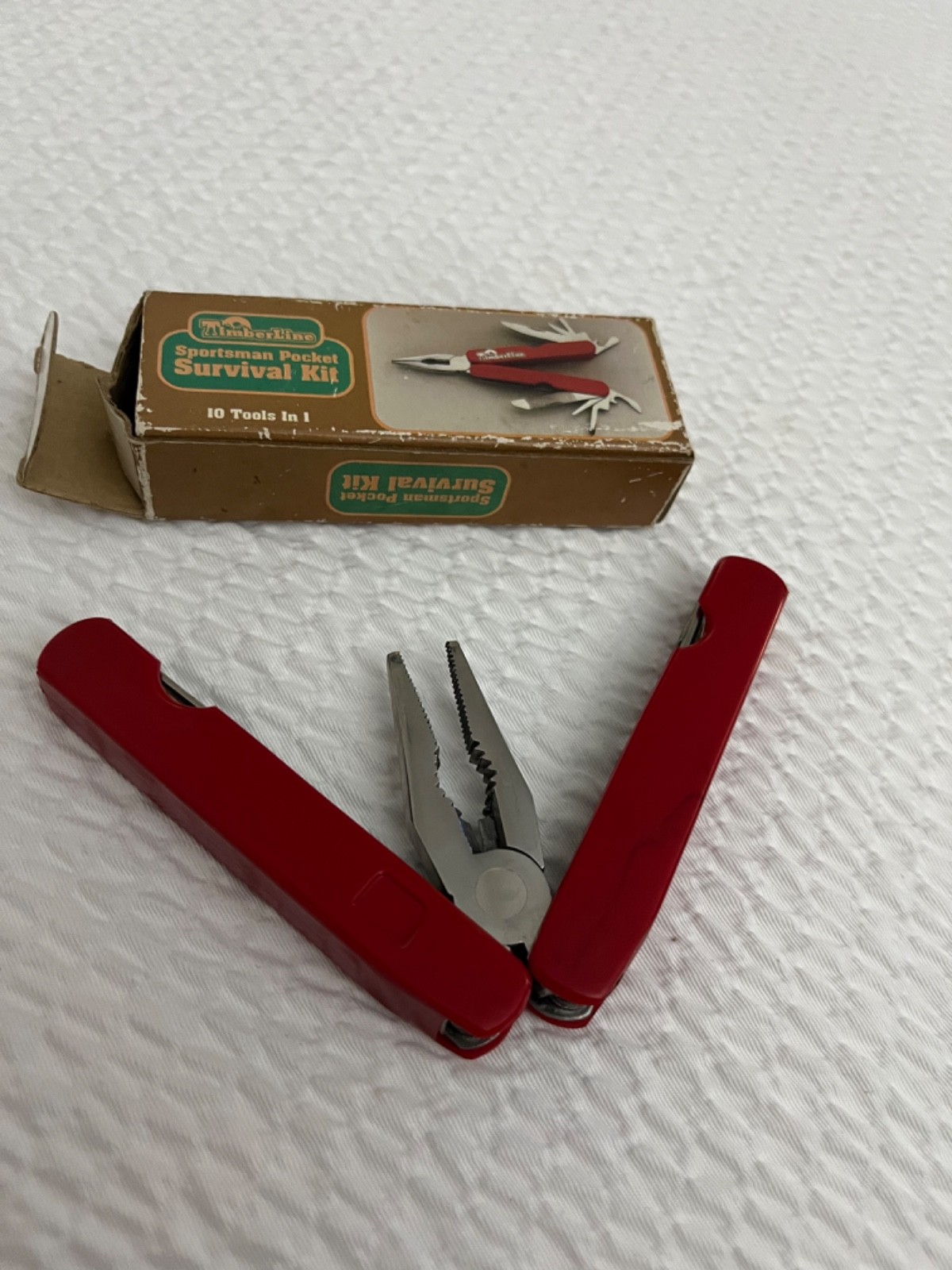 vintage Timberline Sportsman Pocket Survival Kit multi-tool in red