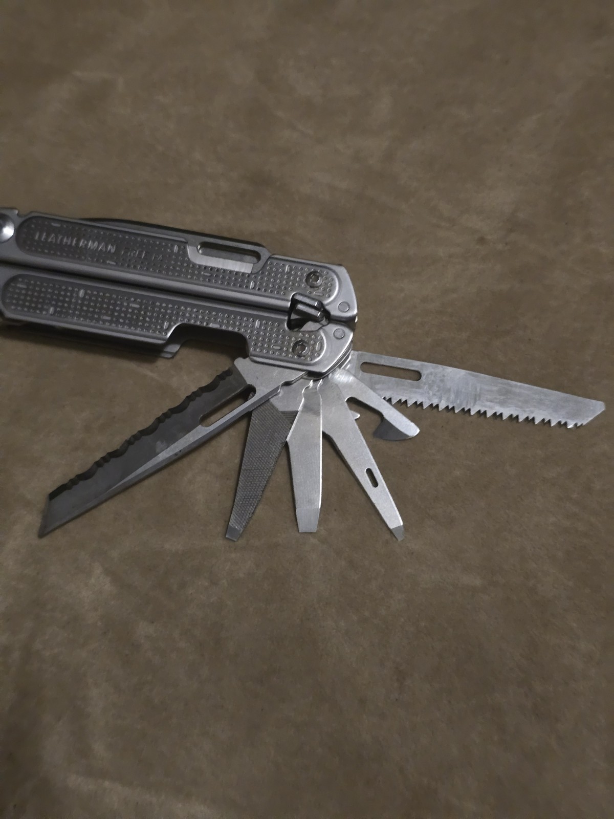 Retired Leatherman Free P4 Multi-Tool With Sheath and Donk Titanium Pocket Clip