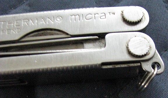Letherman Multi mini Tool with case.