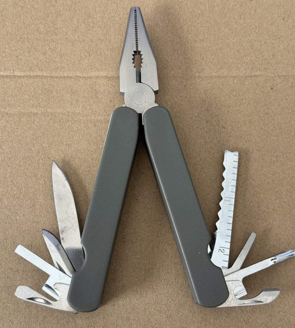 BELL Pocket Multi-Tool 11 Tools w/ Pliers Cutters Opener Flat Head Knife Measure