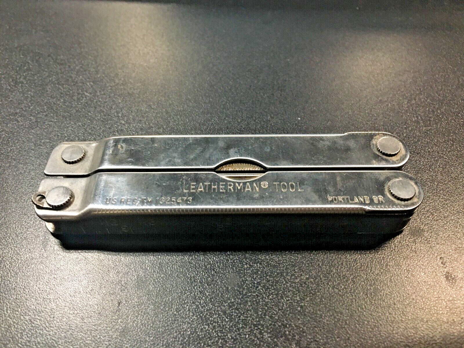 Vintage Original Leatherman TM 1325473 Multi Tool With Leather Sheath