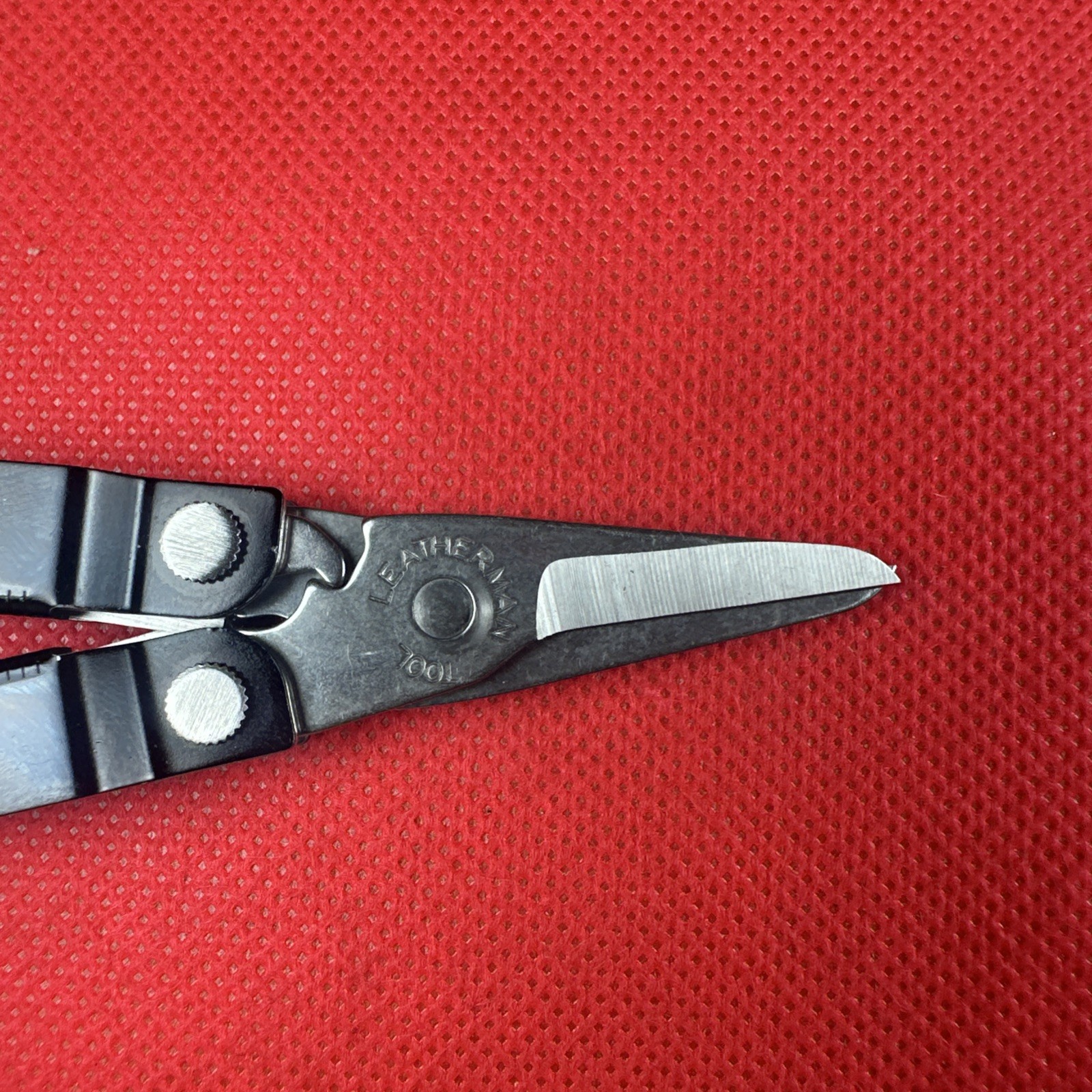 Nice Black Leatherman Micra Multi-Tool, scissor, knife, tweezer, screwdriver