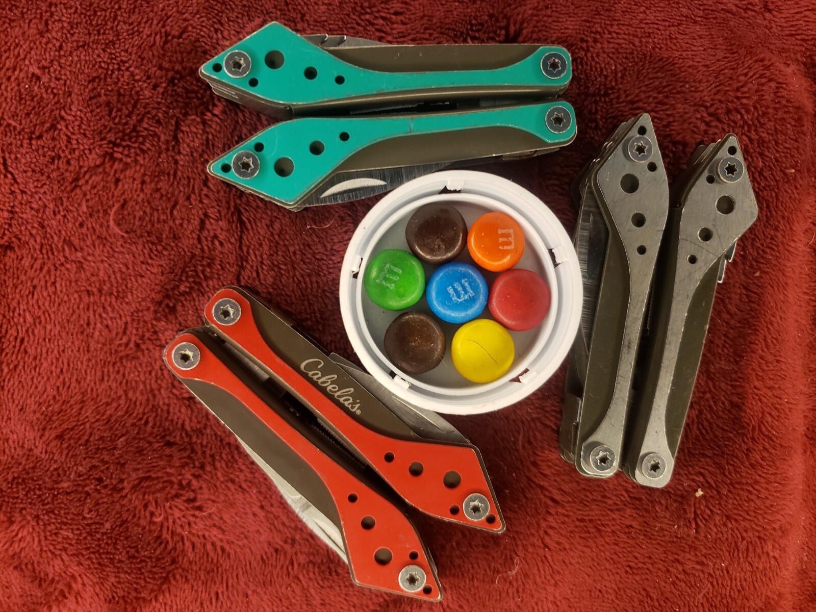 Lot of three Cabela’s Multi Tool Stainless Clear, Teal Green & Red