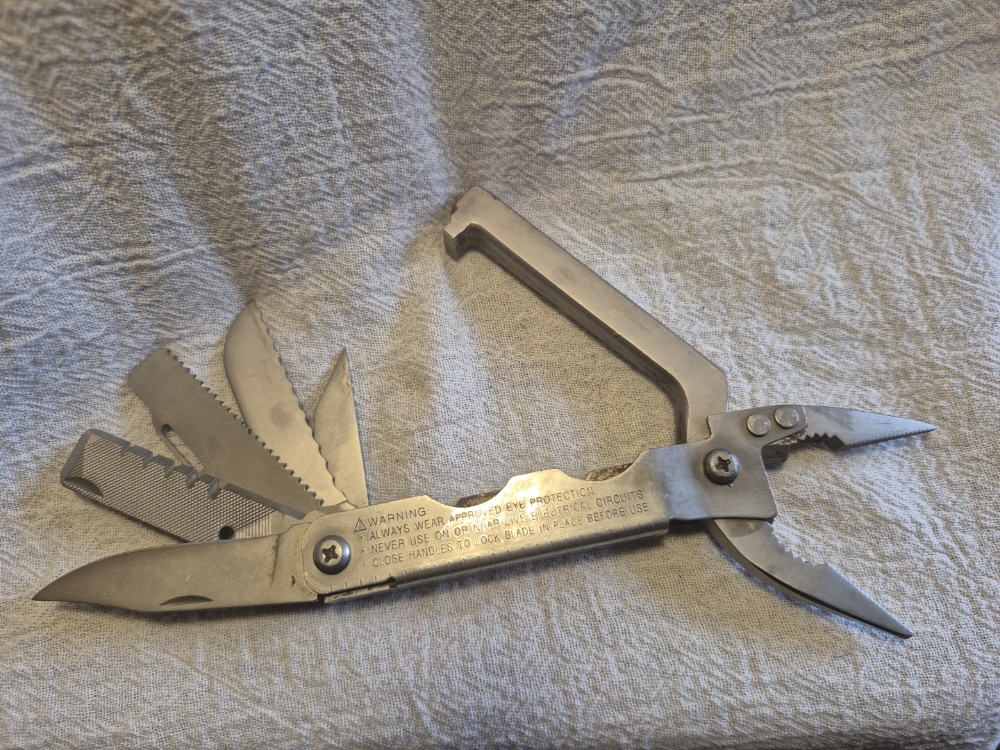 Klein Tools 1016 Multi Tool Pliers, Knife, Saw, File, Saw, Wire Stripper + More