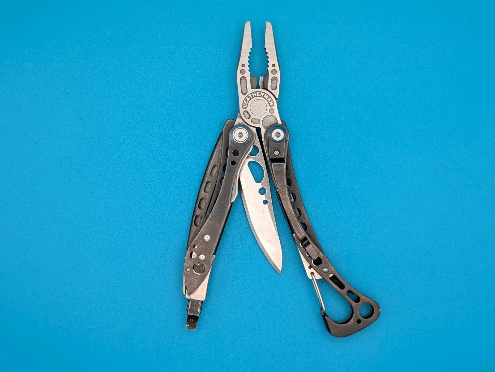 Leatherman Skeletool CX Multitool Plain Edge Knife!