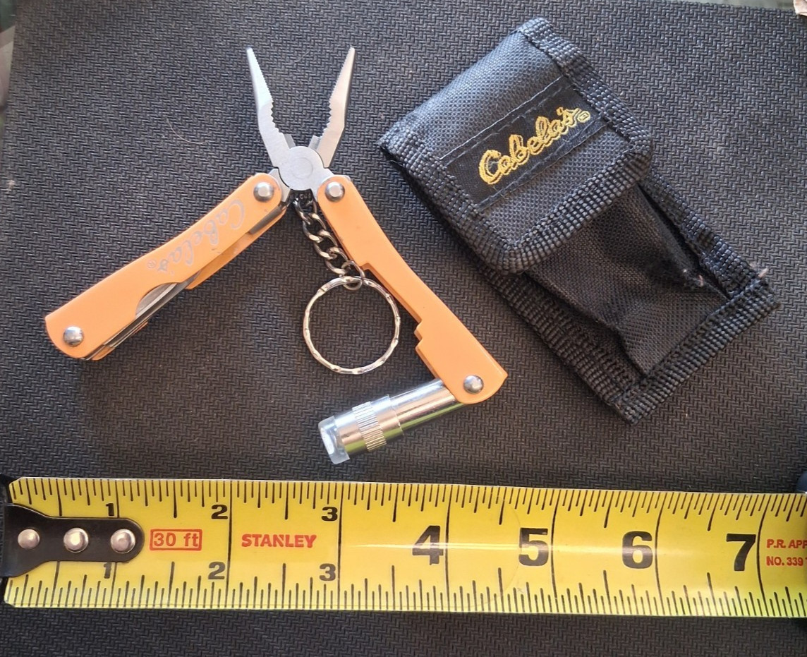 Cabela’s Multi-Tool with Flashlight Case Included