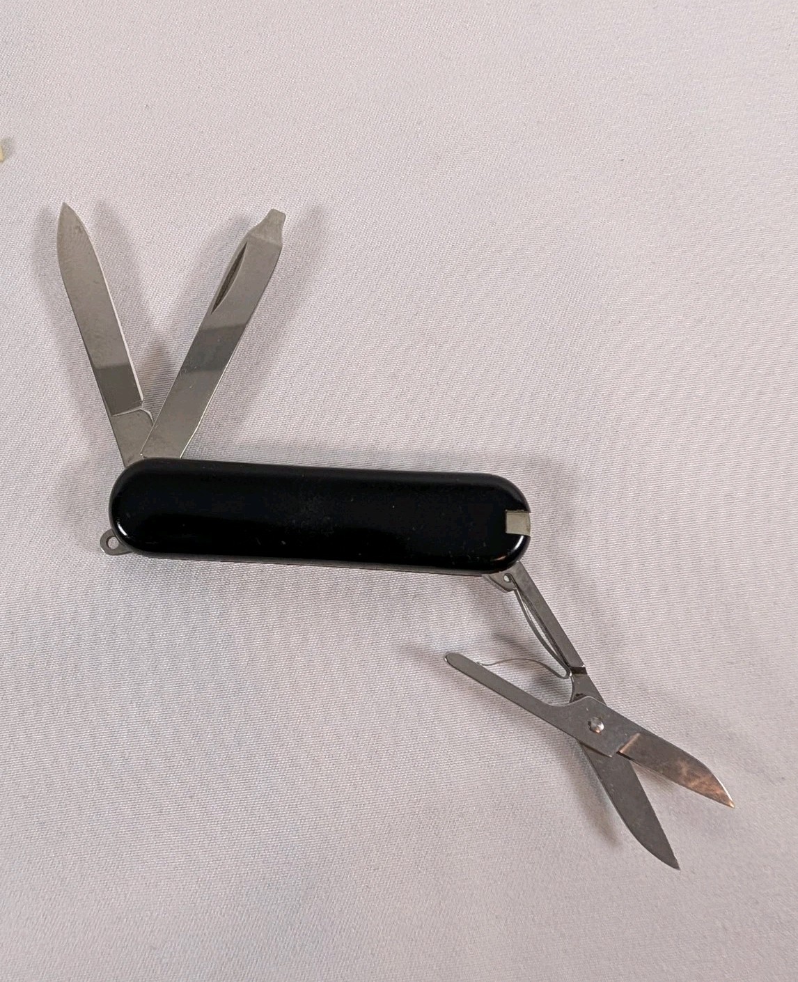 Victorinox Black Multi-Tool Pocket Knife, 5 Tools, Straight Edge Stainless Steel