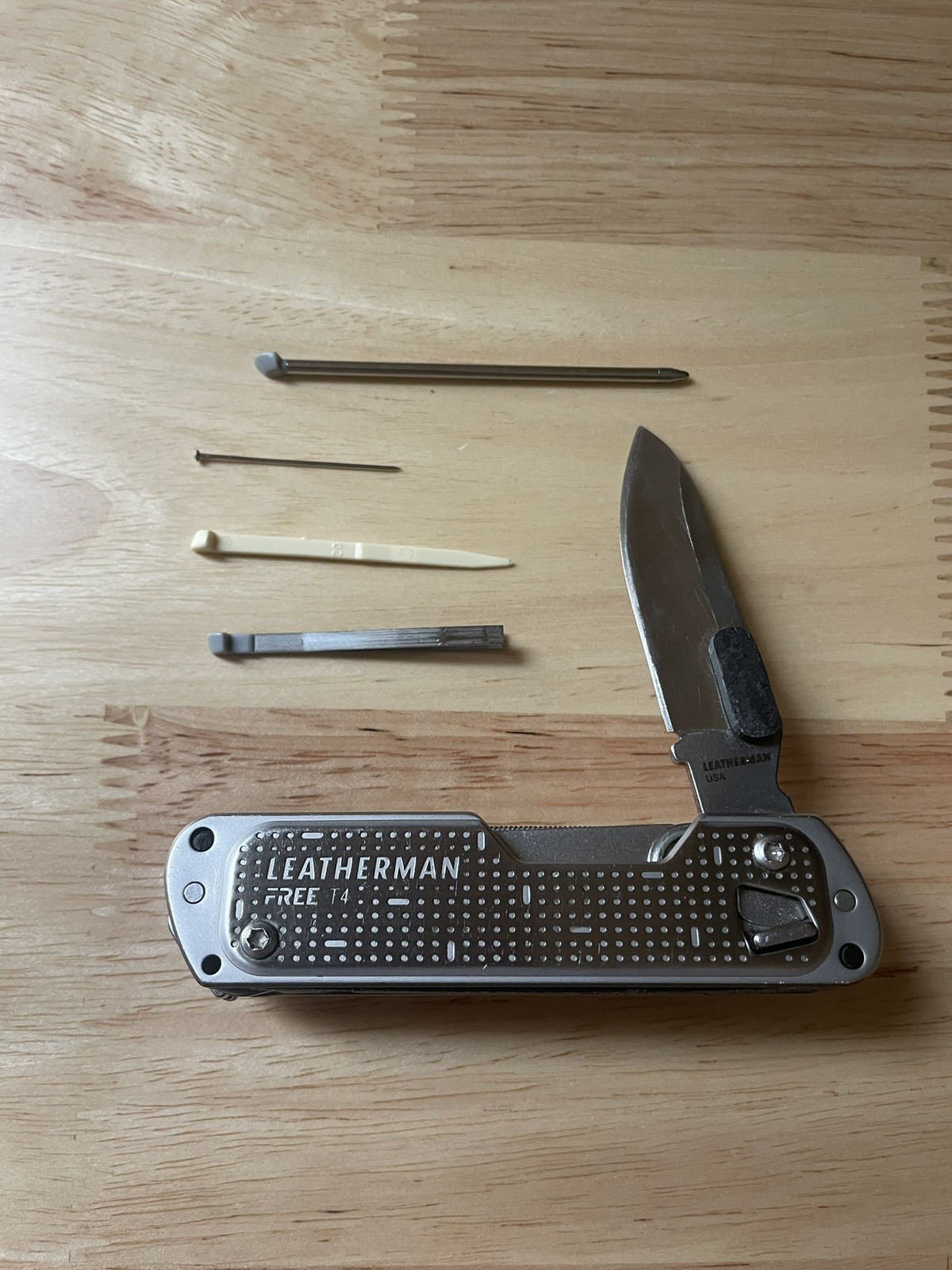 Leatherman Custom Free T4 Multi-Tool w/inserts for Victorinox Scale Tools