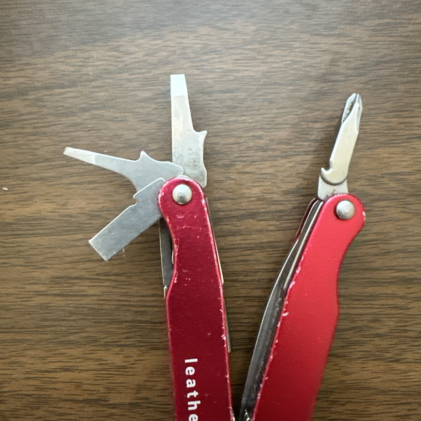 Retired Red Gen 1 Pat pending Leatherman Juice C2 Multitool w/nylon pouch.
