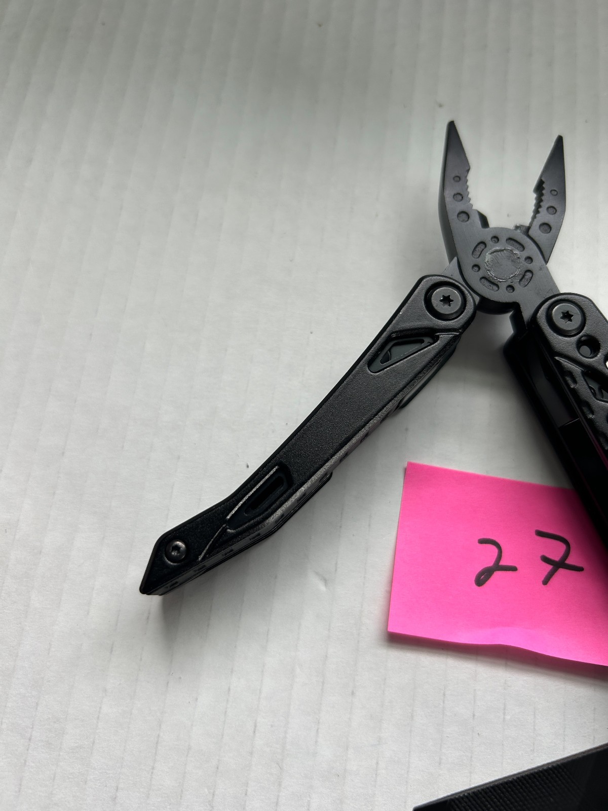 Pohaku Multi Tool with belt holder