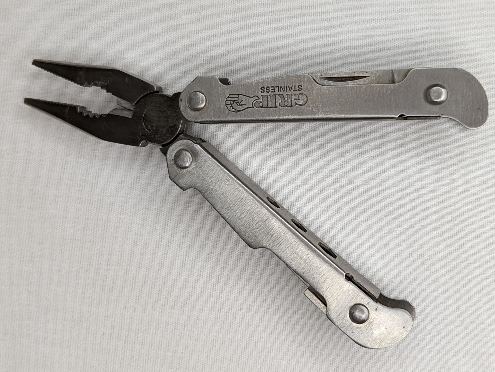 Grip Stainless Multi Tool Pliers, Knife, Bottle Opener, Philips Screwdriver