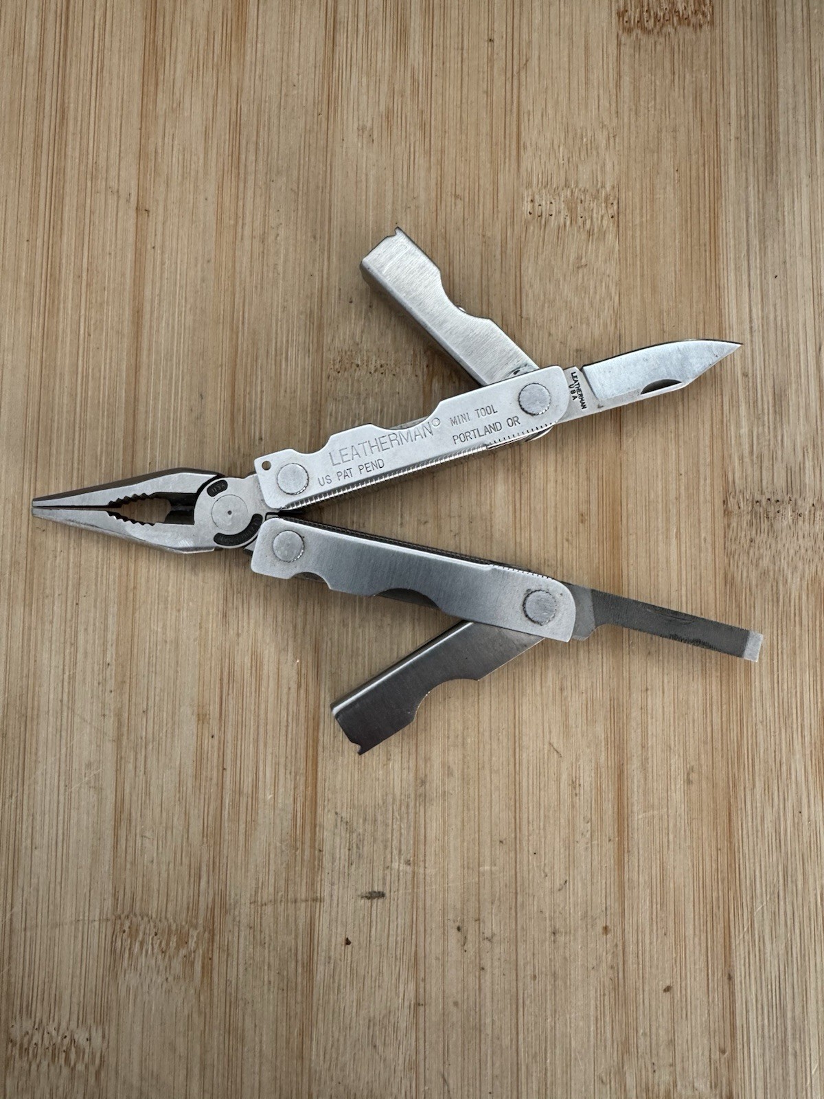 Leatherman MINI TOOL multitool. Variant w/US PAT PEND on Both Sides