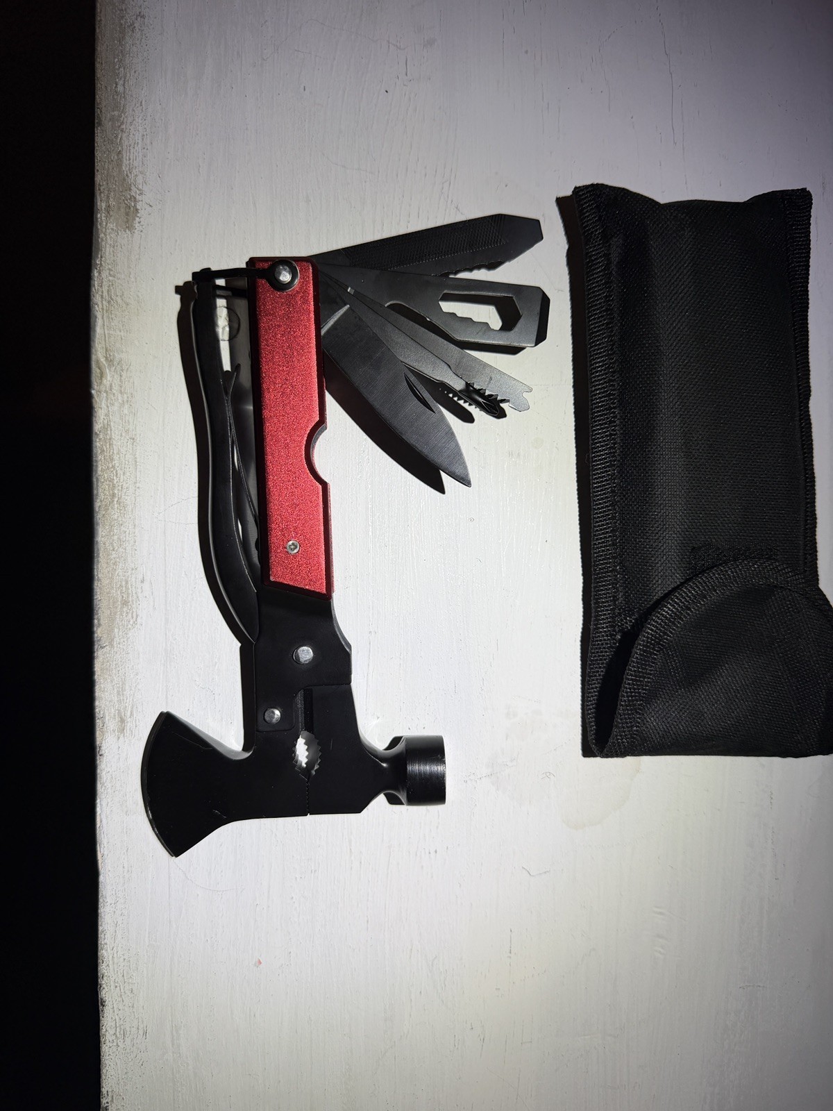 14-in-1 Outdoor Multitool Hammer – Survival Gear with Axe, Knife, Pliers.