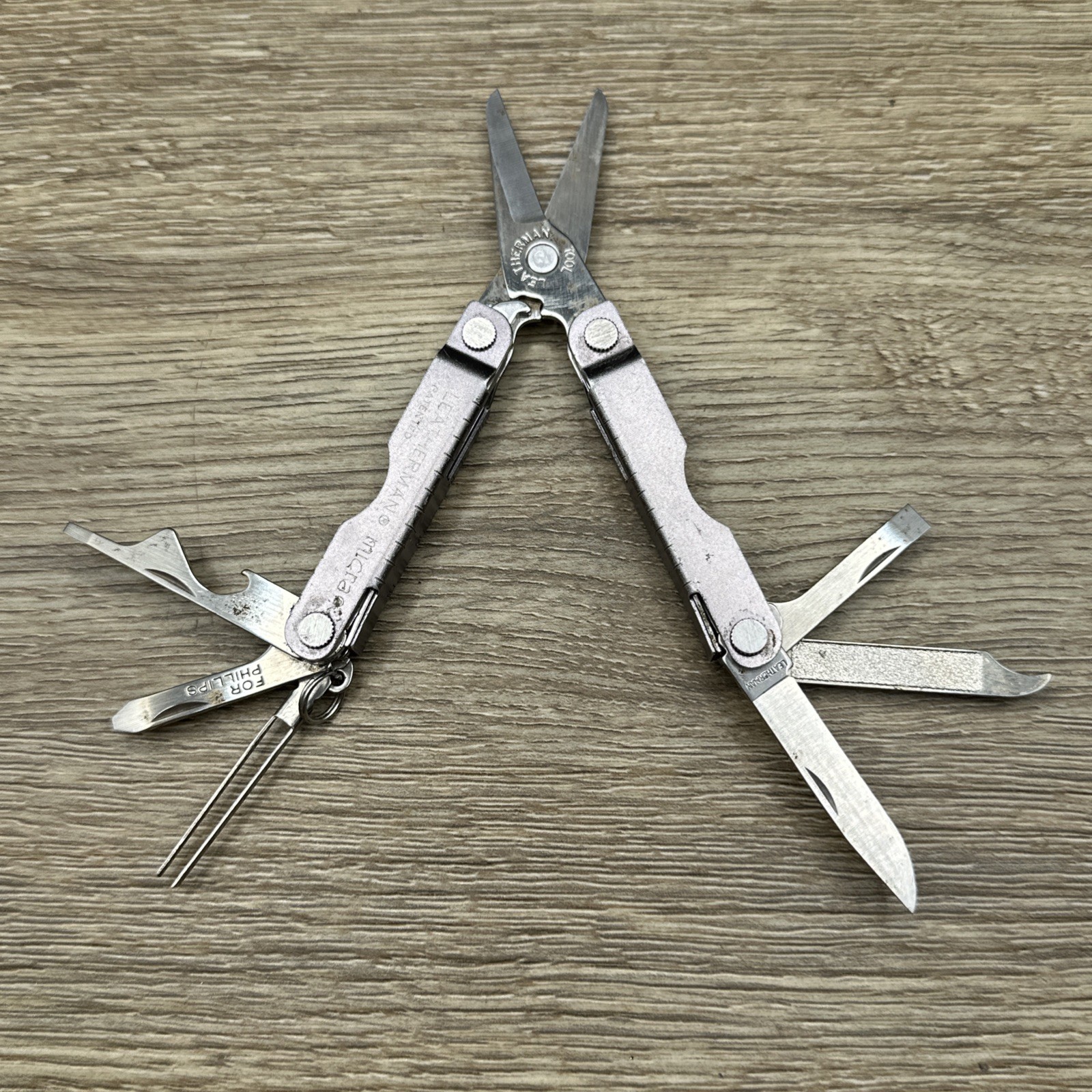 Leatherman Micra Multi Tool Gray Sharper Image Branded