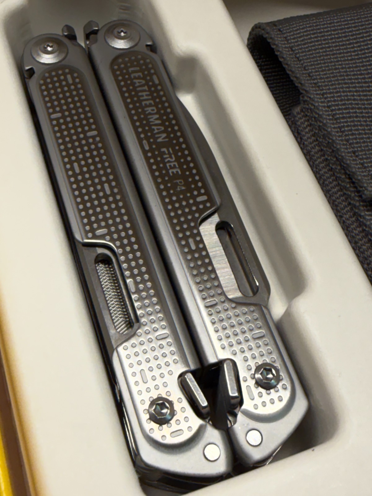 Leatherman FREE P4 Multitool with Nylon Sheath. New in Open Box. Discontinued.