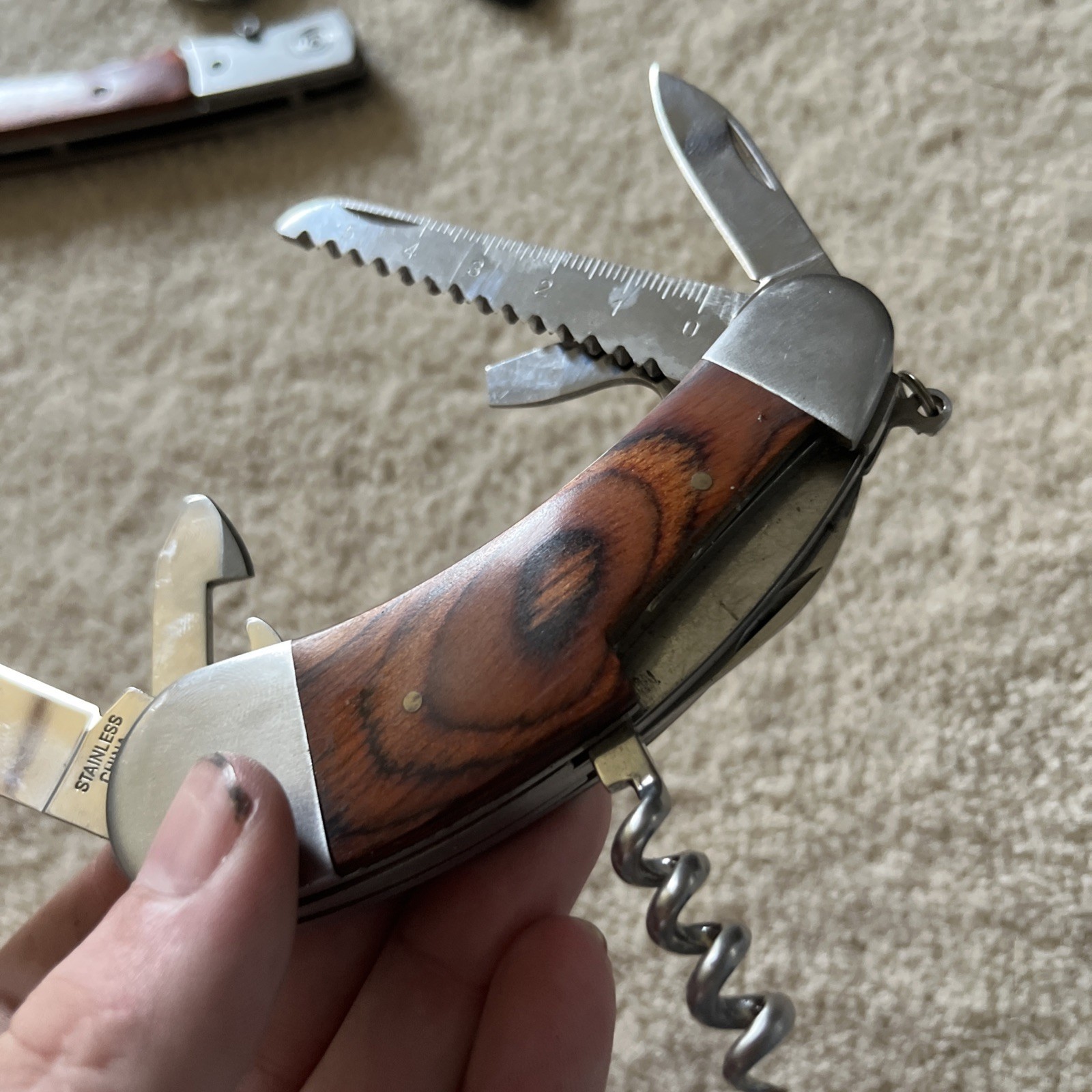 Camping Knife Wooden Handle with 7 Different Tools Attached with a Hanging Ring