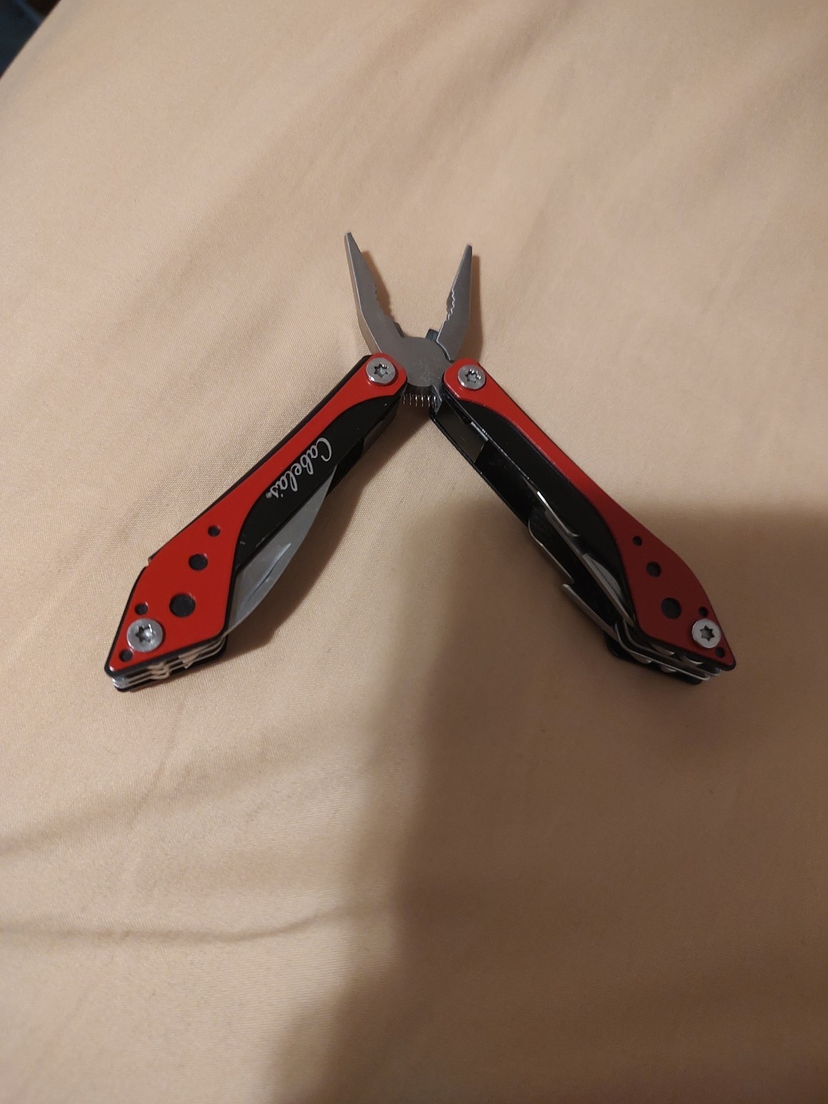 Cabela’s Multi Tool Red Many Different Tools In It Nice For Little Things