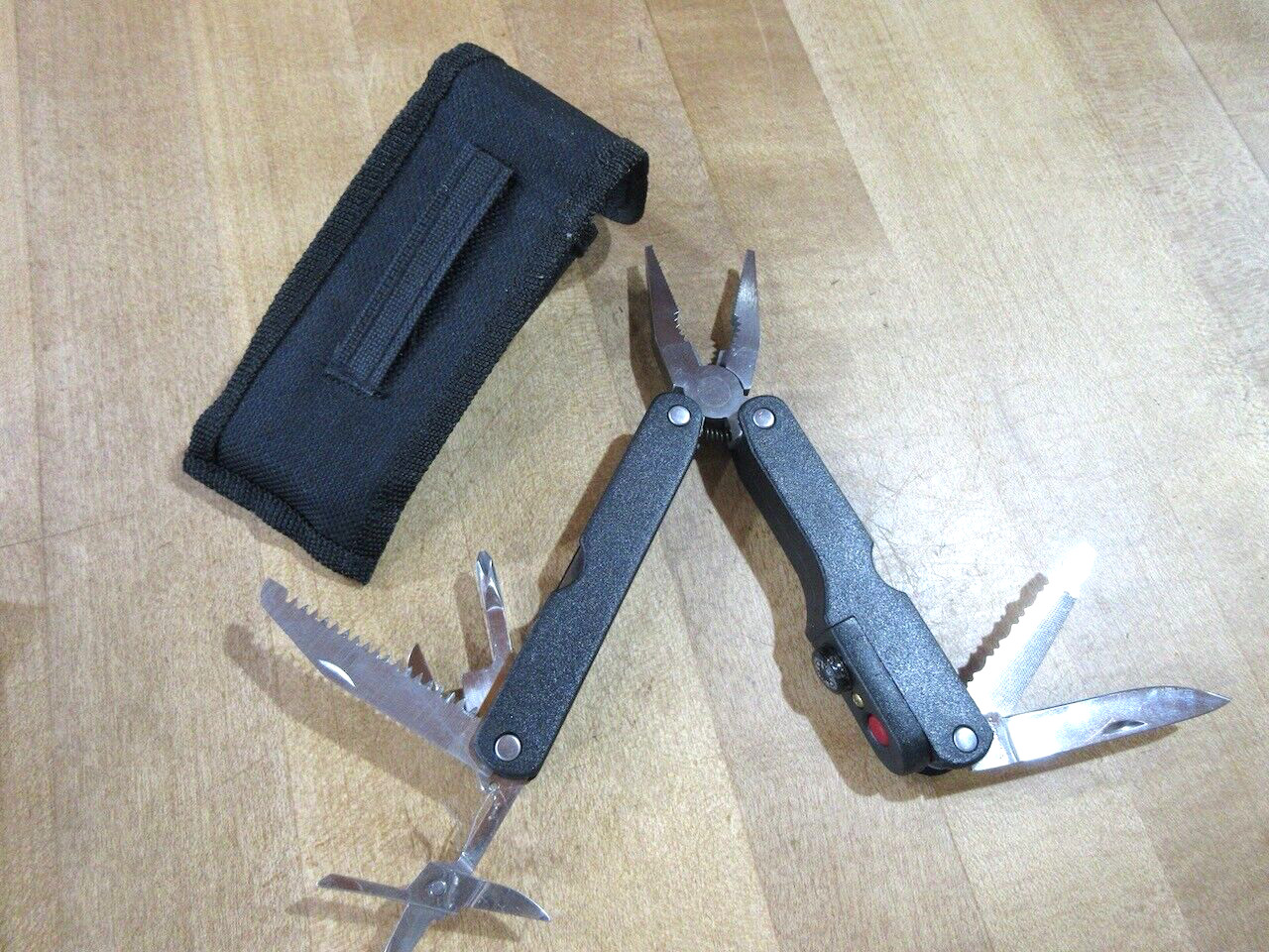 Carolina Multi Tool inc compass & light in nylon Sheath (w10)