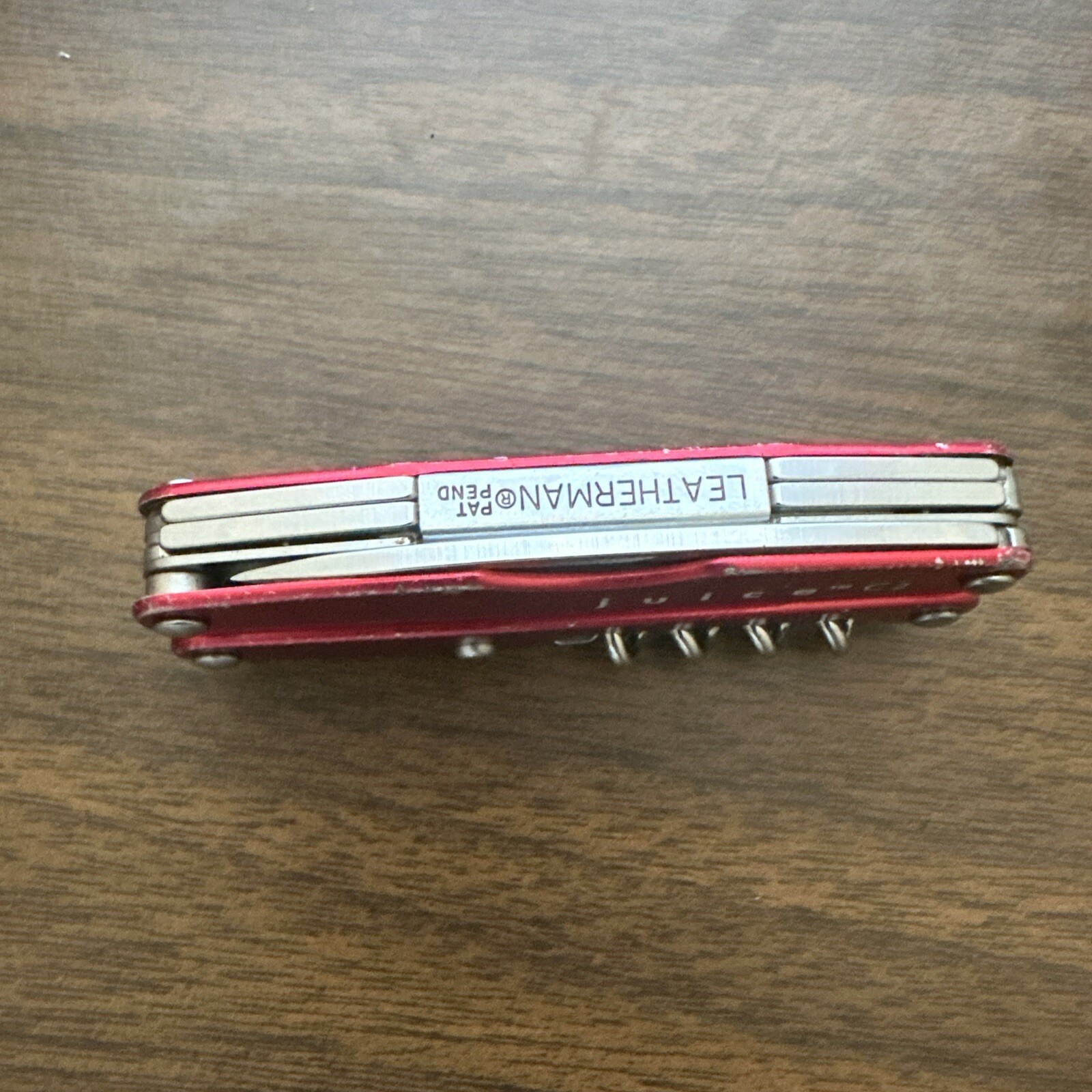 Retired Red Gen 1 Pat pending Leatherman Juice C2 Multitool w/nylon pouch.