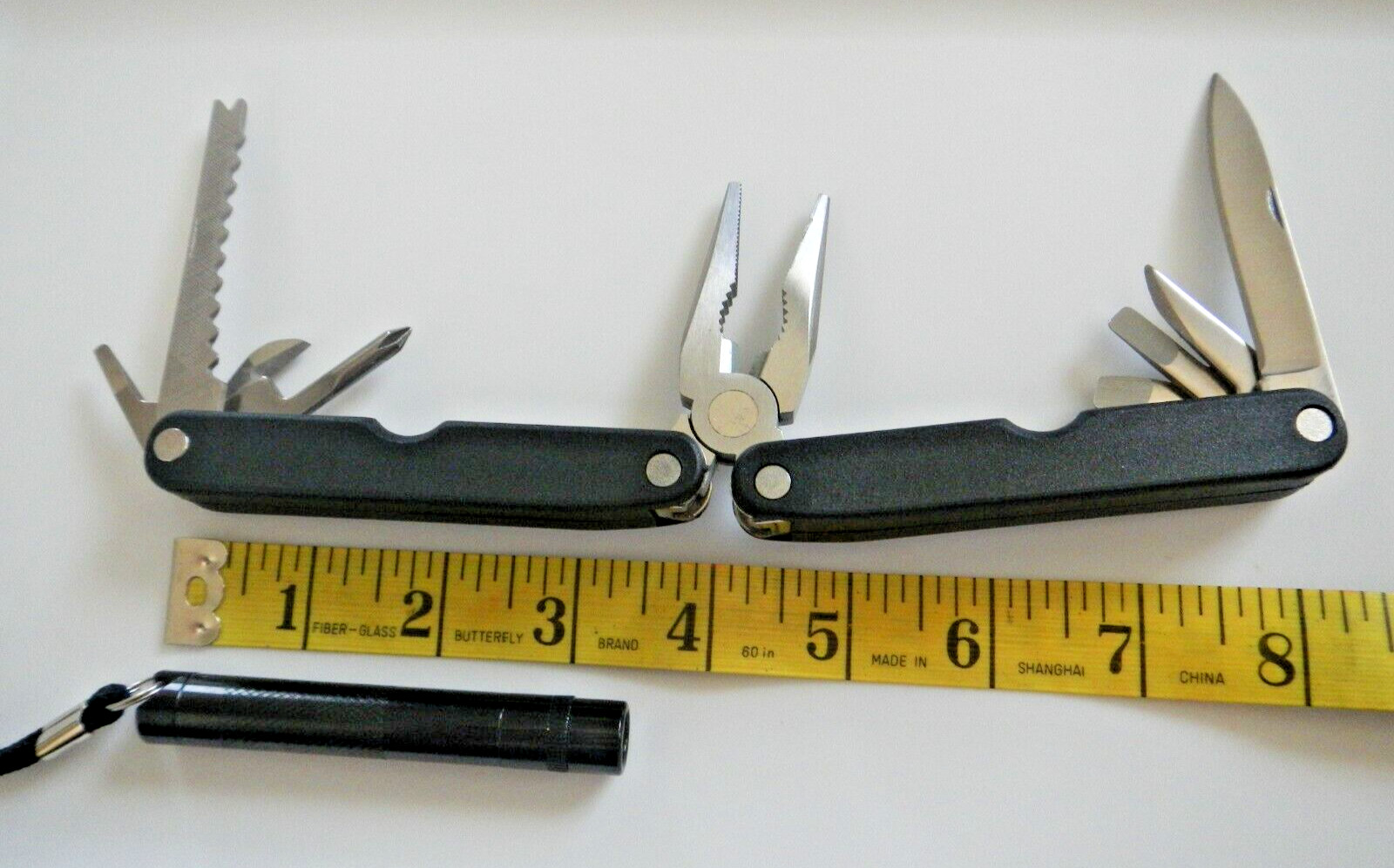 MULTI TOOL with FLASHLIGHT & CARRYING CASE – NEW – SEE PHOTOS FOR INFORMATION