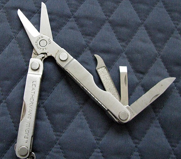 Letherman Multi mini Tool with case.
