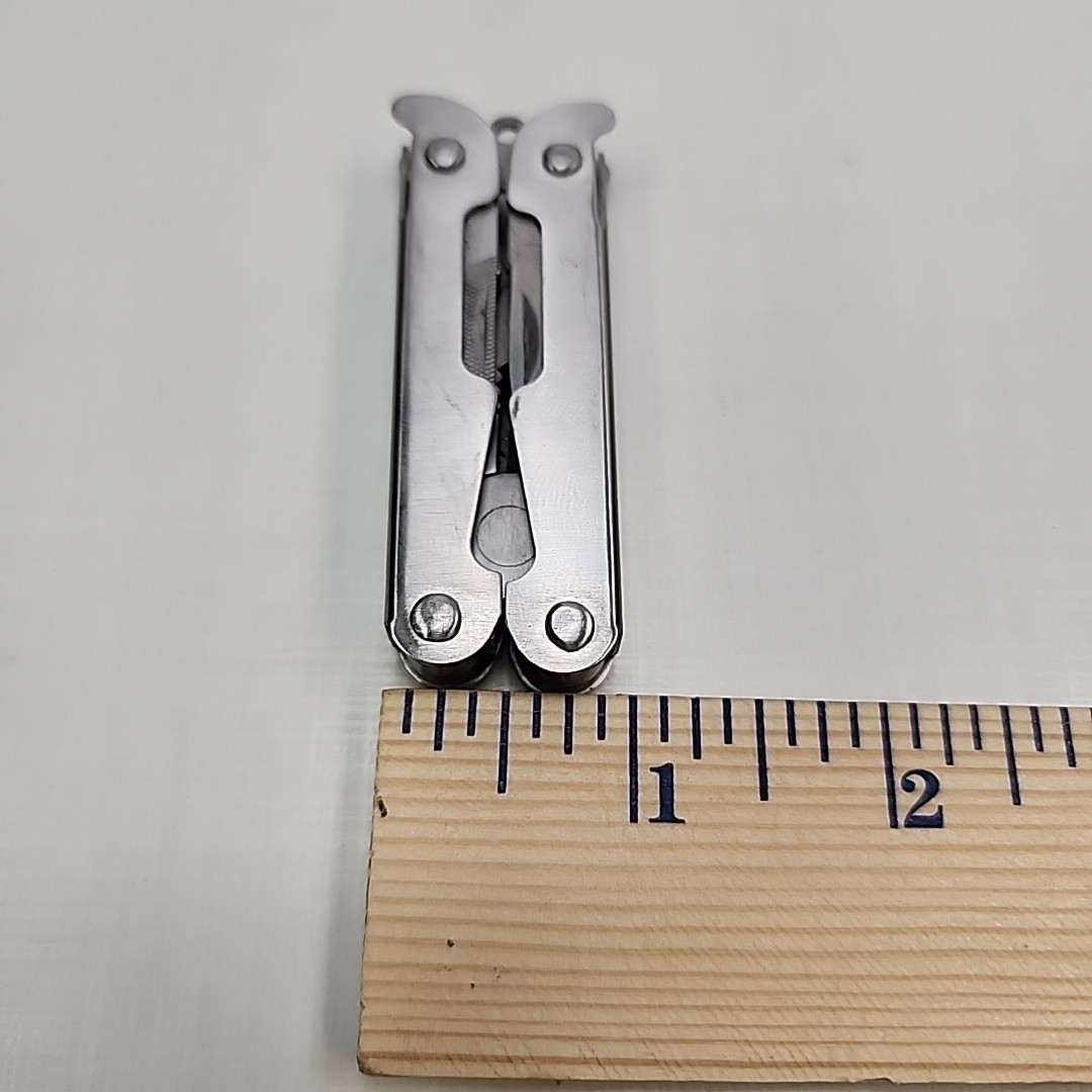 Pocket multi tool unbranded, plier, knife, file, screw drivers, awl, can opener