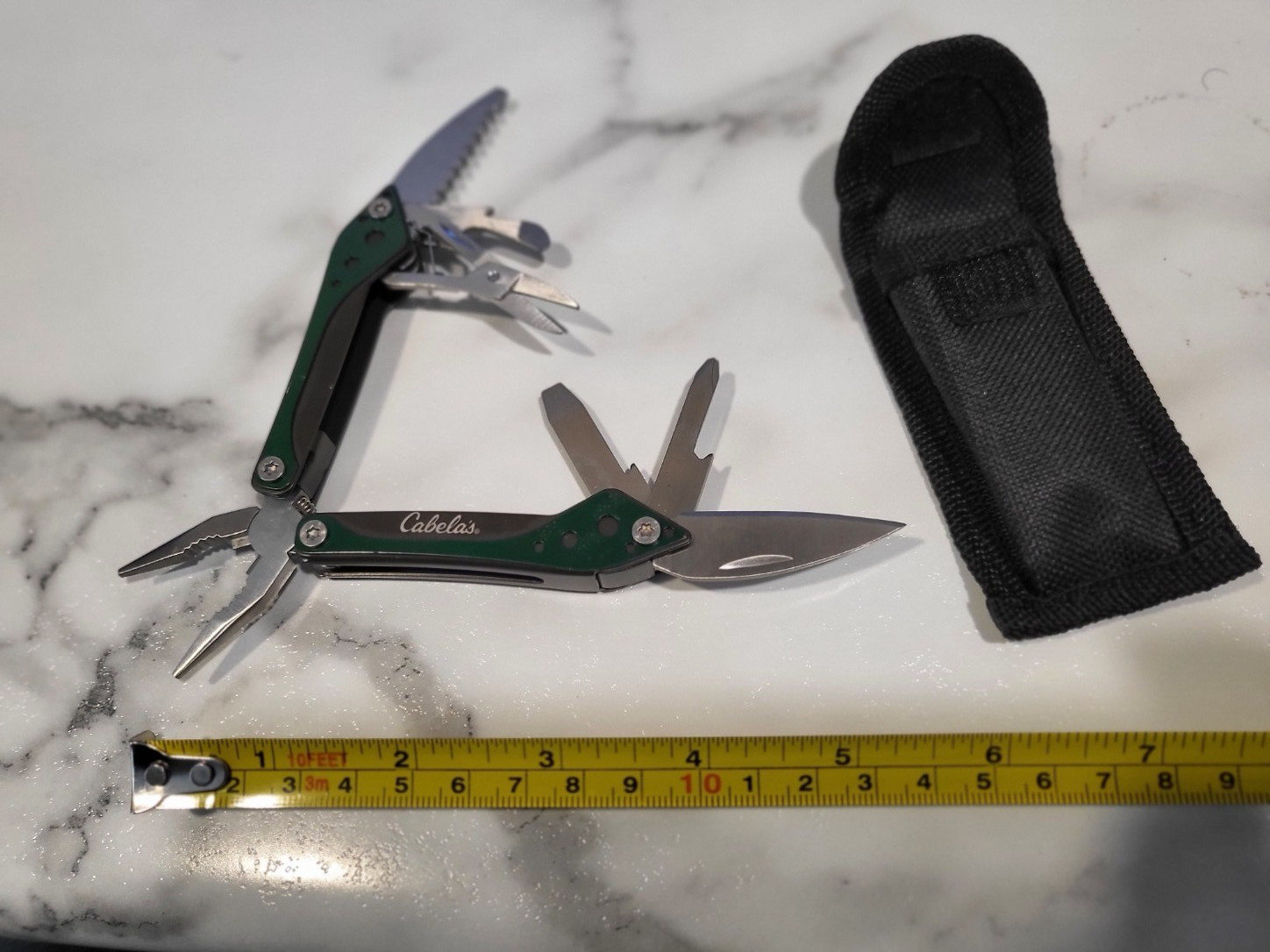 Cabela’s Multi-Tool in Green, 8 tools in one handy pocket knife