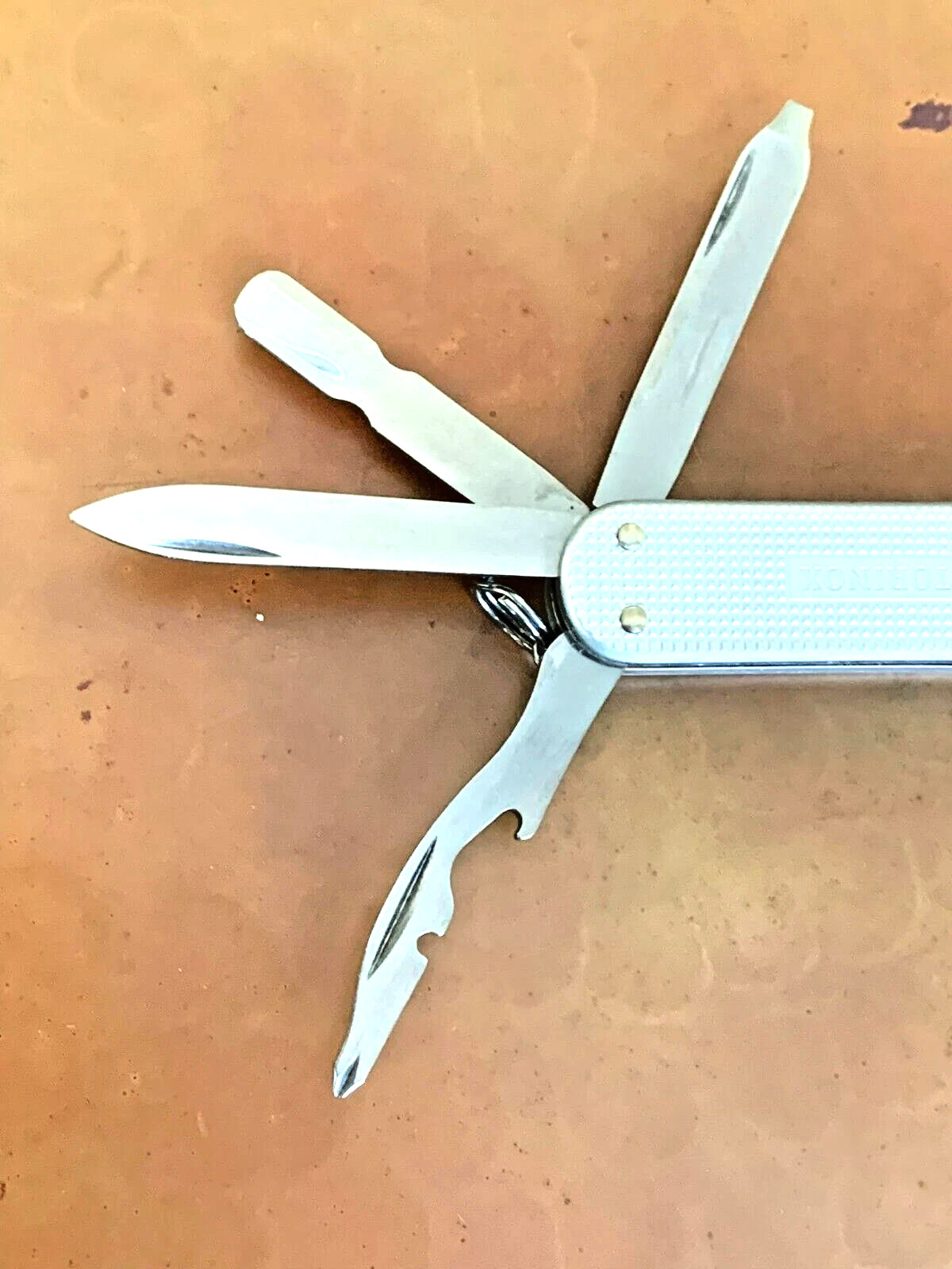 Victorinox MiniChamp Alox Swiss Army Knife, Silver Textured Scales, 14 Tools