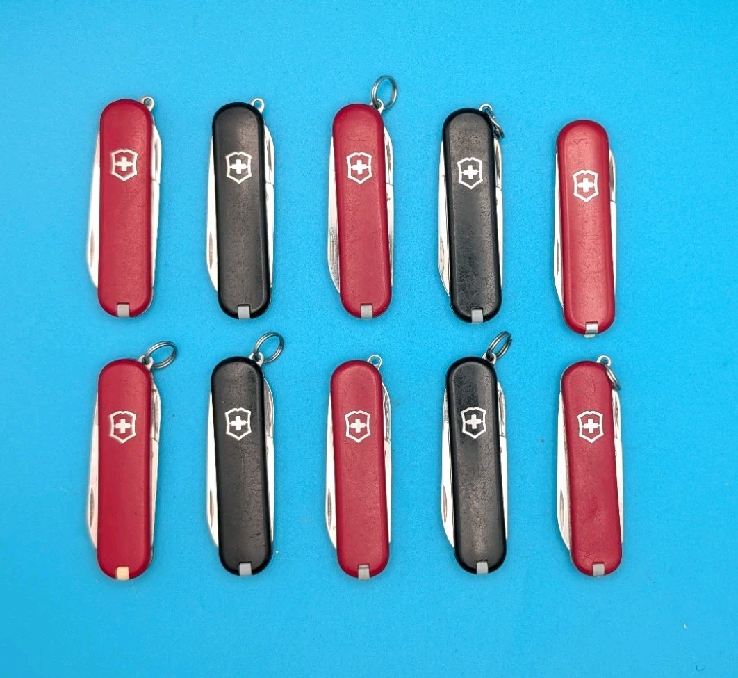 Lot of 10 Victorinox Classic Swiss Army Knife Multi Tools!