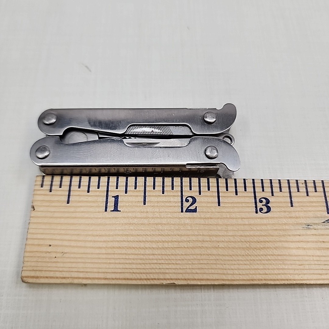 Pocket multi tool unbranded, plier, knife, file, screw drivers, awl, can opener