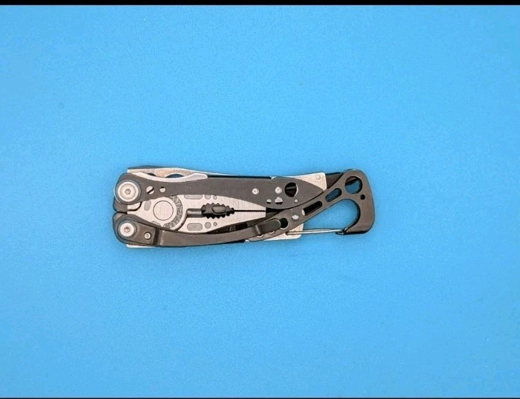 Leatherman Skeletool CX Multitool Plain Edge Knife!