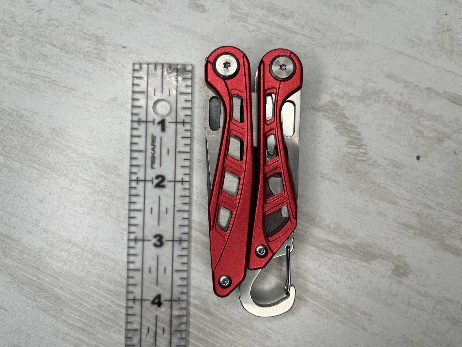 Basics 10-in-1 Stainless Steel Multitool Safety Lock with Nylon Sheath Red