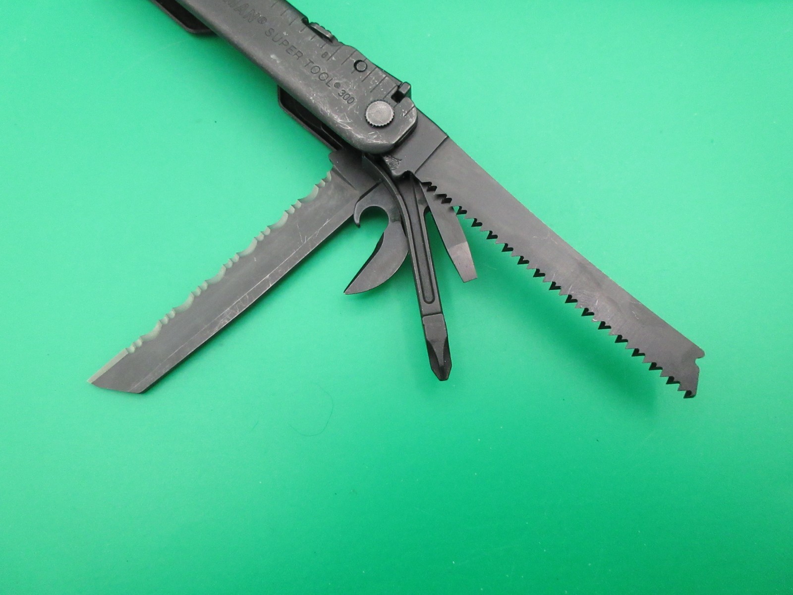 Leatherman Super Tool 300 Black Oxide Folding Multi Tool Knife Saw #60A
