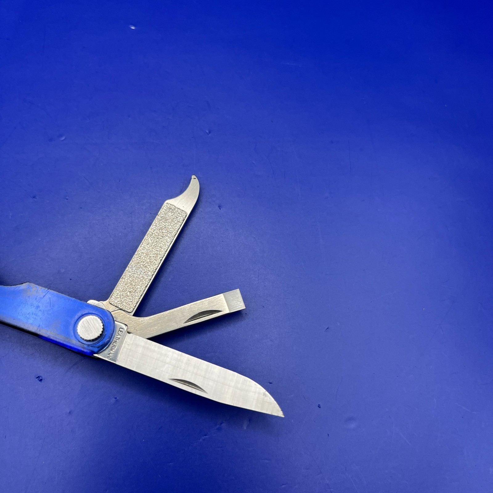 Leatherman Micra Multi-Tool Knife, Scissors- Blue Translucent