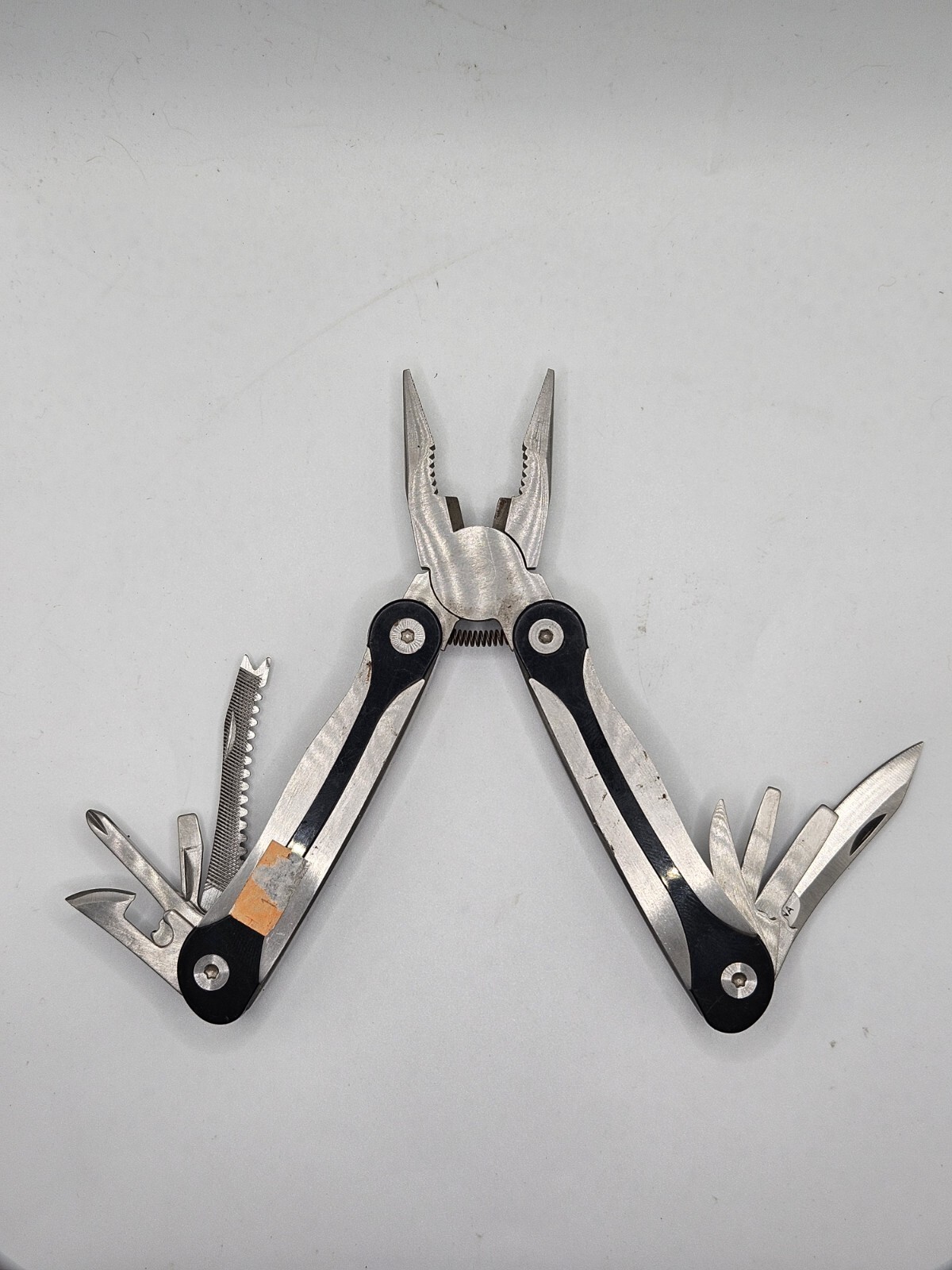 Unbranded Spring Loaded Multi-Tool In Silver And Black