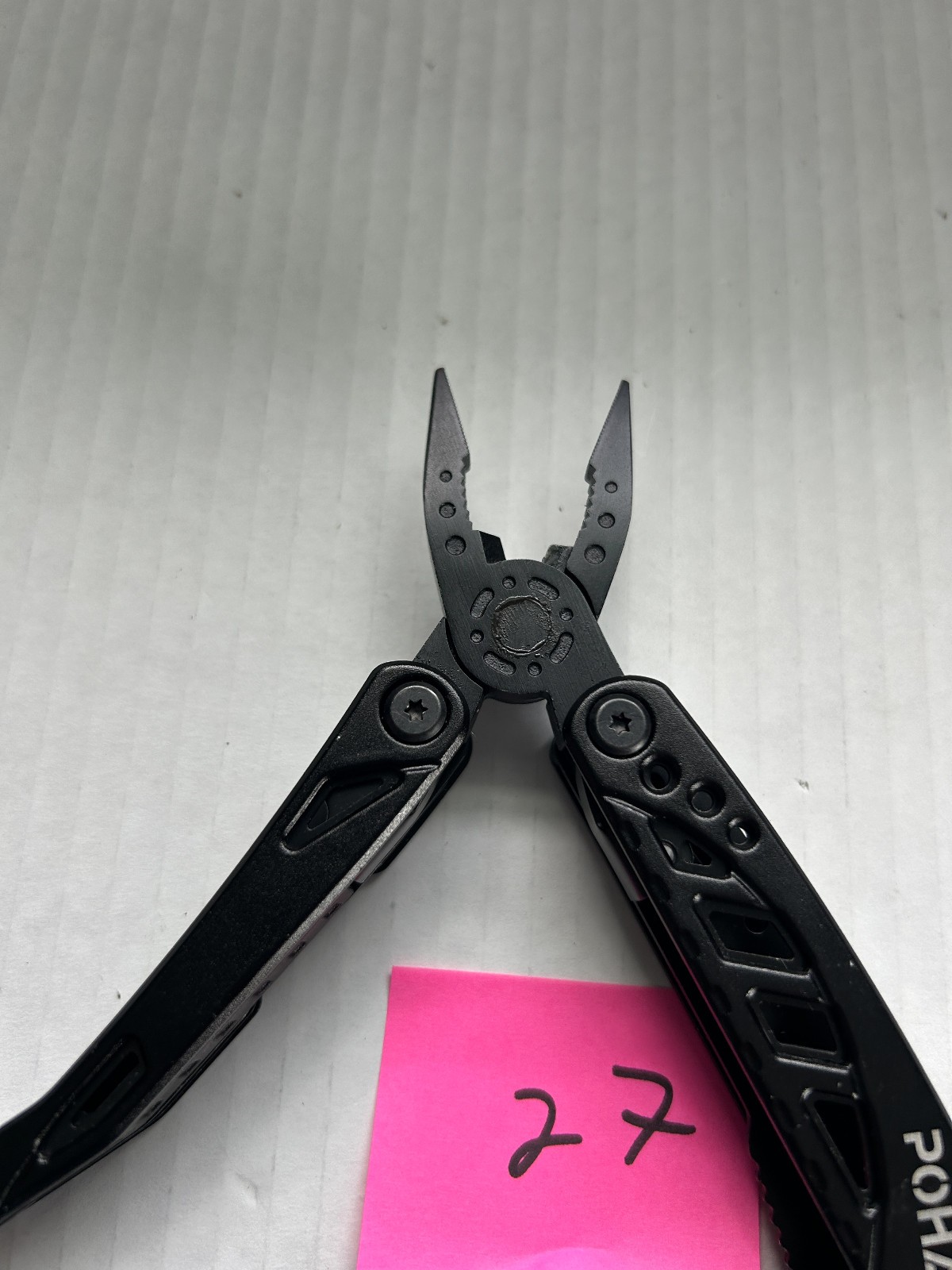 Pohaku Multi Tool with belt holder