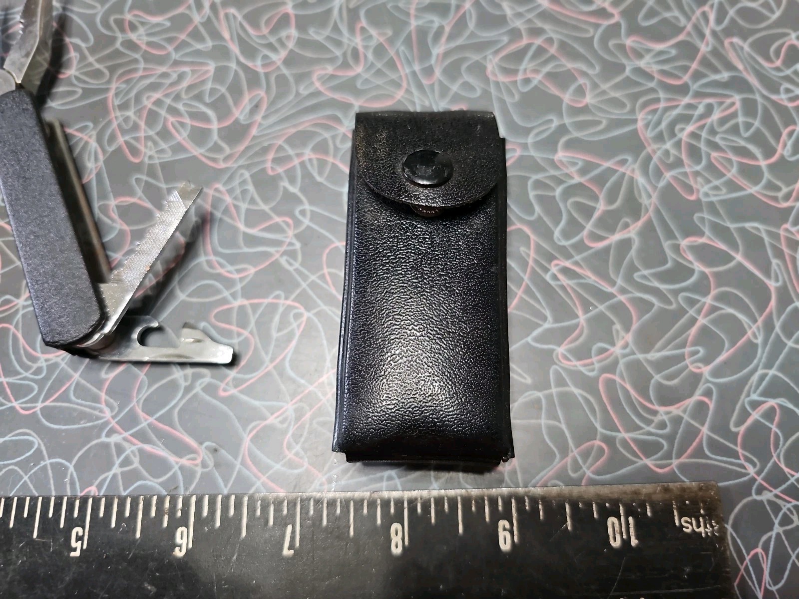 Vintage Multi-Tool with Black Belt Sheath Made in China Pliers Knife Screwdriver