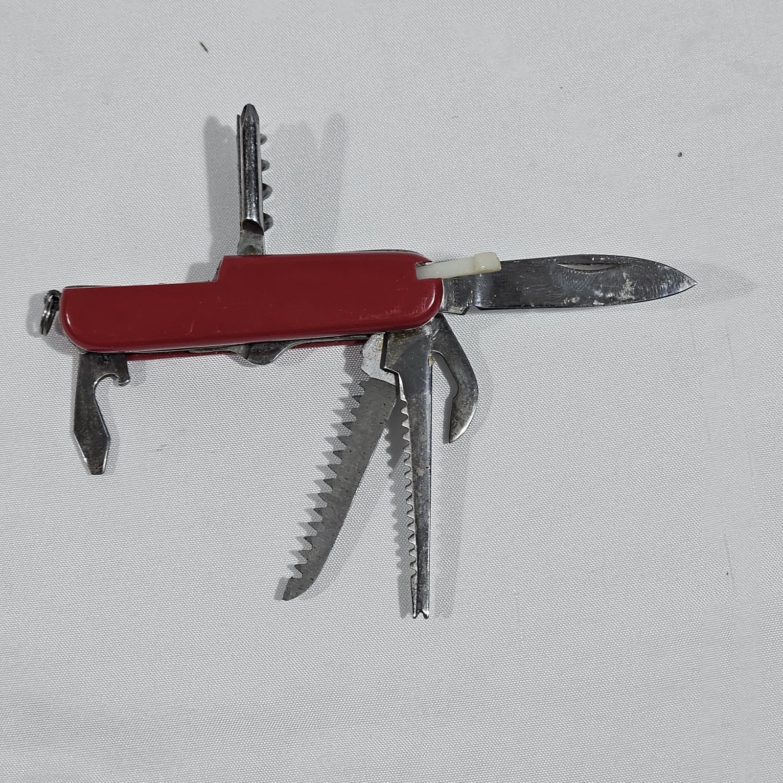Red Multi-Tool Knife with Scissors, Serrated Knife, Corkscrew, Bottle Opener